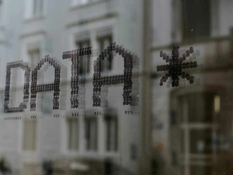 word data followed by a star printed on a window