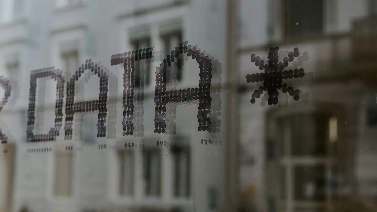 word data followed by a star printed on a window