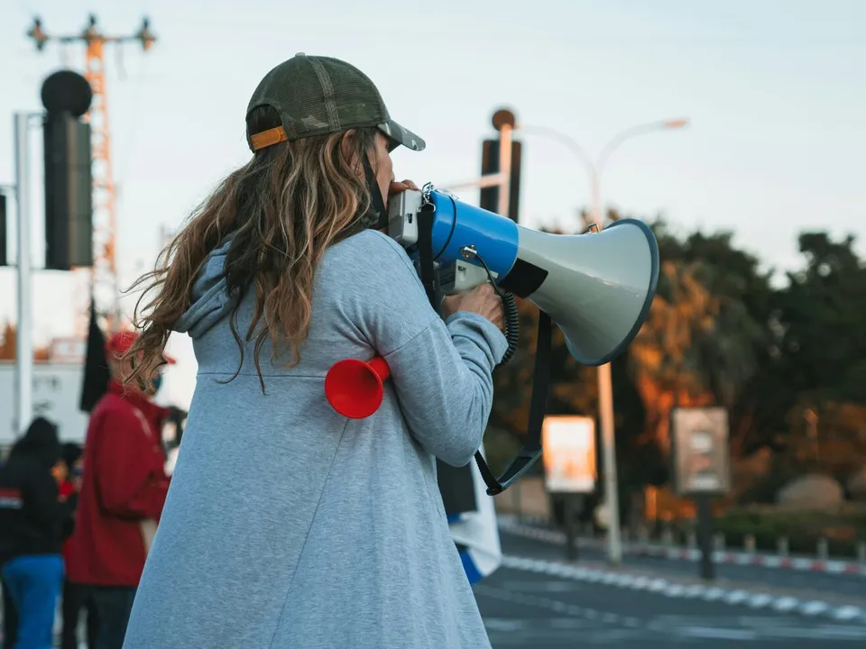 woman speaking in a megaphone