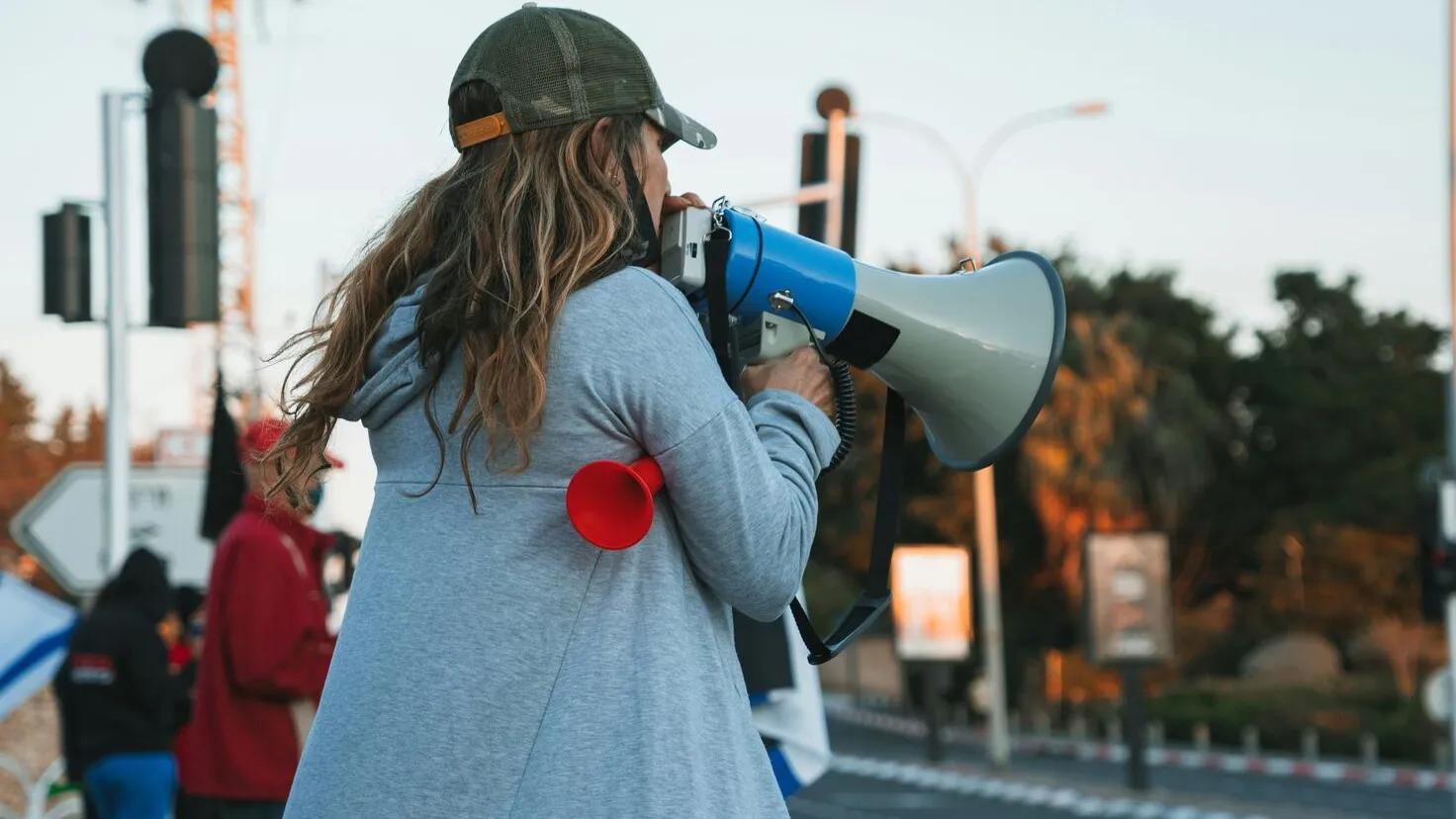 woman speaking in a megaphone
